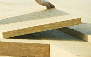 measuring Cowslip Green tapered insulation